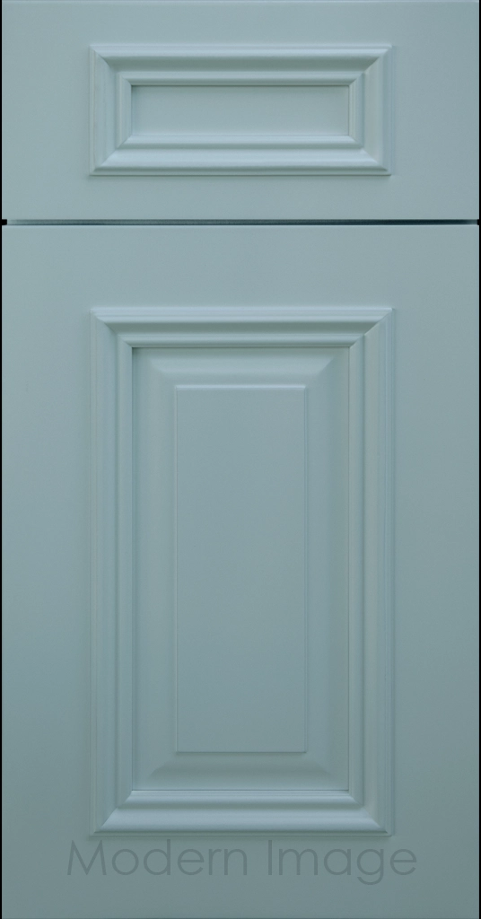 Heritage custom cabinets in a Niebla Azul finish with classic raised panel doors and modern flat slab drawers.